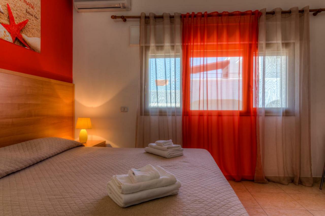 Aquarium Residence San Pietro in Bevagna Bagian luar foto